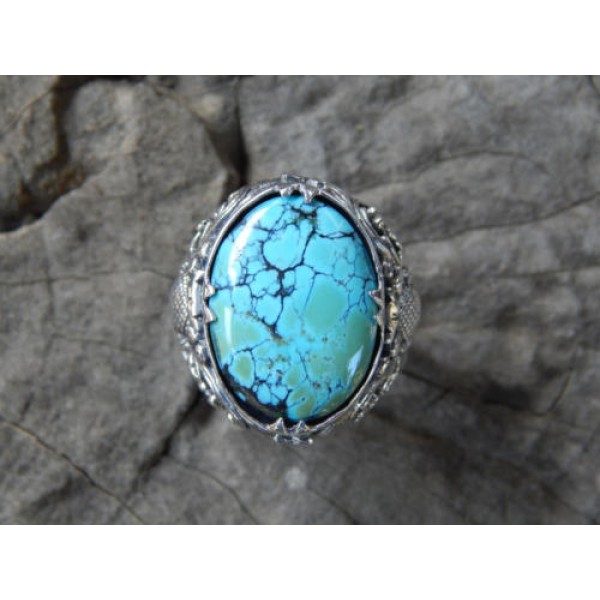 Silver ring flower motif with Turqoise stone